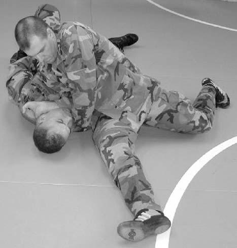 Choke from the knee mount with hand on near side of enemy s neck, step 1. (b) Step 2 (Figure 4-77).