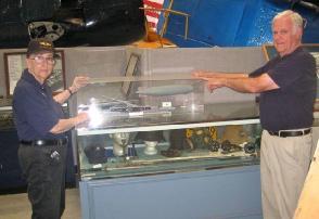 The unit has been in a transition phase characterized by a rearranging of display cabinets and the establishment of a panel wall that will protect the interior of the display area while increasing