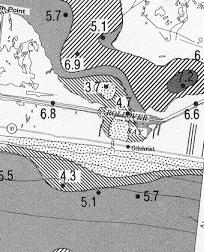 This is substantiated by a map of surface sediments which shows a bulge of sand just offshore from Rollover Pass (Figure 13).