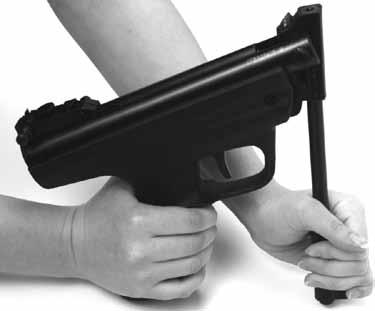 With your off hand, grab the barrel near the front sight and push the barrel down and back toward the grip. You will notice a clicking sound.