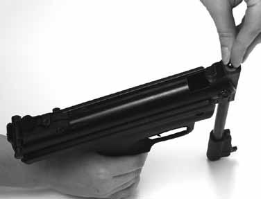 (C) Load the pellet so the head or nose goes in first. After loading the pellet, grab the barrel near the front sight and swing the barrel back to the starting position.