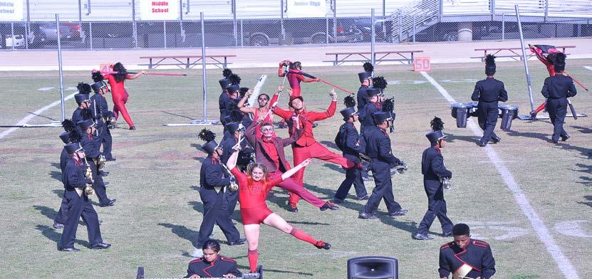 This group requires a fee to purchase equipment not supplied by the school. ColorGuard During the fall semester, the Colorguard participates with the band at all performances.