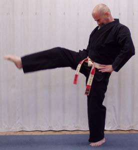 Extend right foot outward with toes