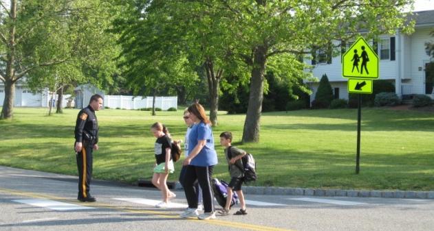 A teacher is on duty in the parents parking lot during arrival and dismissal. Students who walk to school should not arrive before 8:40 a.m. Students are to wait on the porch until 8:50 a.m. when they will be allowed in the building.
