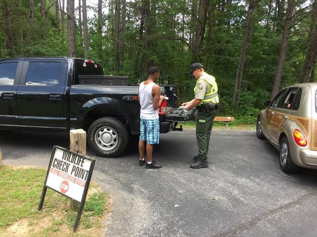On May 20 th, Sgt. Mike Barr and Parks Officer Matt McDaris held a road block at Rocky Mountain Public Fishing Area (PFA).