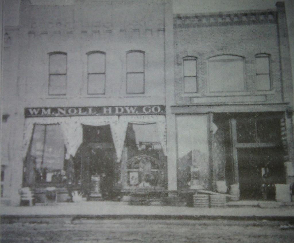 Double store of Wm. Noll Hardware Co. with addition to the south (on right) being built sometime between 1887 and 1891. (photo from Marshfield Illustrated, by C.W. Charles, 1905) Wm.