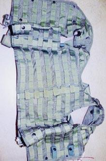 Below, a redesigned antiexposure coverall and liner are two products of the AMELIA program, which aims to provide personal equipment that fits the physical dimensions of a wider range of users.