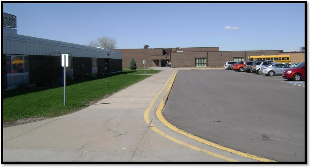 (left) and Rosemount Middle School (center) share a parking lot for staff and parent parking, as well as bus loading/unloading.