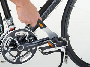 Tighten by turning your 15mm pedal wrench to the right.