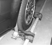 The chock must be positioned as close to the tire as possible and no further than 1¼ inch from the tire when