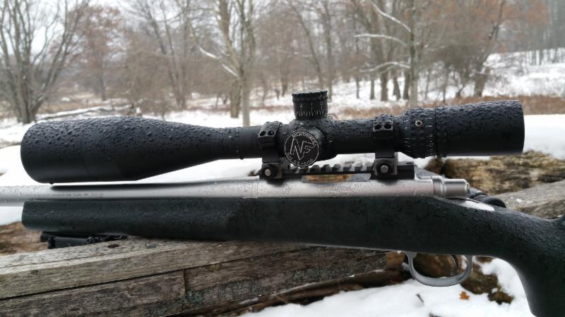 I was sitting among the large majestic Northern Michigan white pines...waiting in peace. Then I noticed just how awesome my rifle setup looked in the freezing rain.