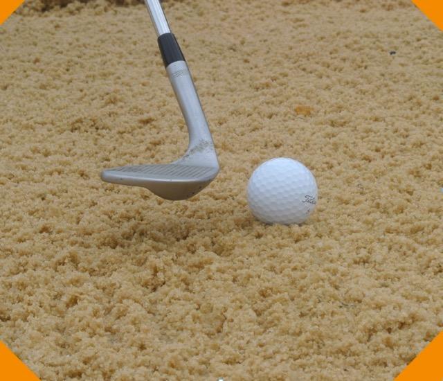 In the bunker, you are not allowed to touch the sand with your club before you hit.