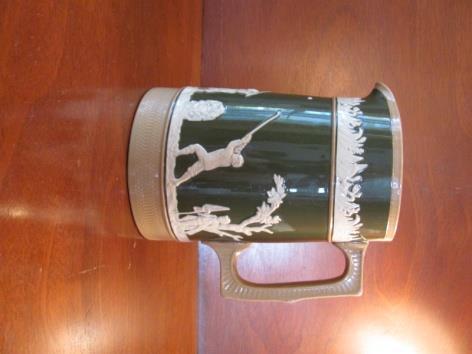 #2 1. A Copeland 7 golfing pint jug in pale blue pottery, the sides decorated on