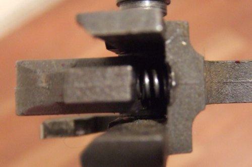 Right: AK-47 disconnector spring situated below