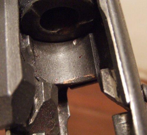 As evidenced in the pictures, the VZ-58 locks by means of a dropping locking