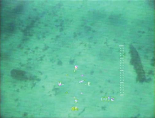 AUV sonar imagery and suspected UXO ROV video image of MK82 bomb
