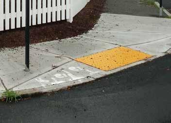 curb ramp and detectable warning strip Curb ramps provide access from the sidewalk to the street for people using wheel chairs and strollers. They are most commonly found at intersections.