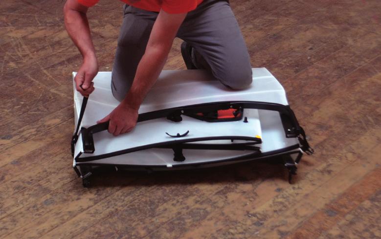 Folding the Oru Kayak back into the box The Oru Kayak box holds all the loose components, and can also fit a paddle,