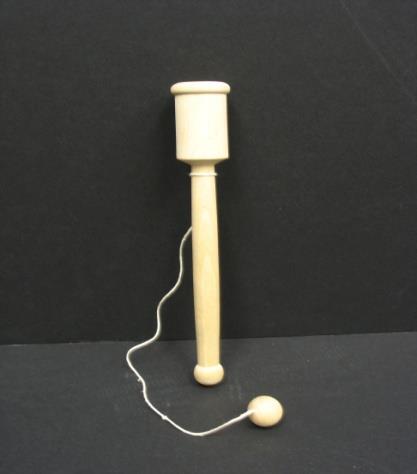 The object of the game is to knock down as many of the wooden pins as possible with each roll of the ball. The first player to score exactly 31 points is the winner.