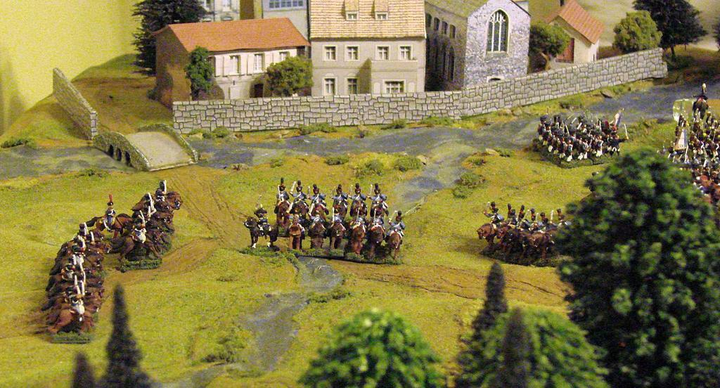 The Spanish regulars are making a convincing attempt to drive the French away from the windmill.