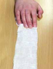 Creepy crawlies Use a bandage about 75cm long. Child to be seated at a table. Place the unrolled bandage in front of them, stretching it out vertically.