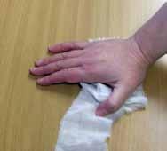 Creeping thumbs Use a bandage about 75cm long. Child to be seated at a table. Place the unrolled bandage in front of them, stretching it out horizontally.