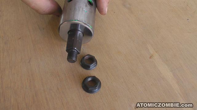 On this crank axle, bolts were included at the ends, so nuts are used.