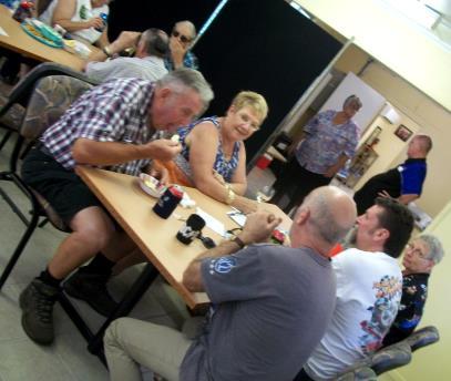 This photo to the left shows our Club President Roy Johnston caught by the cameraman eating his Pavlova at the 2014 CSAQ Christmas Party.
