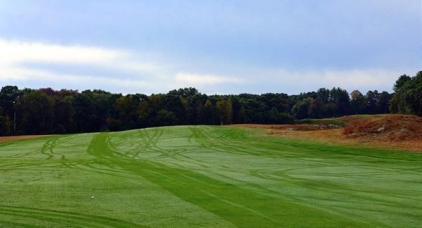 Like the 4th, the bunkerless 8th green is built with severe slope from high right to