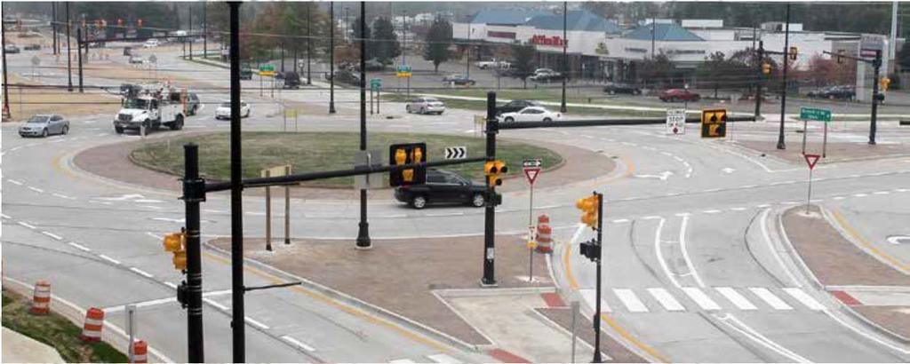 Example #3 Orchard Lake Road Farmington Hills MI Opened 2015 60k ADT Design Year Urban constrained context High-capacity, 3-4 lane roundabout Provisions for