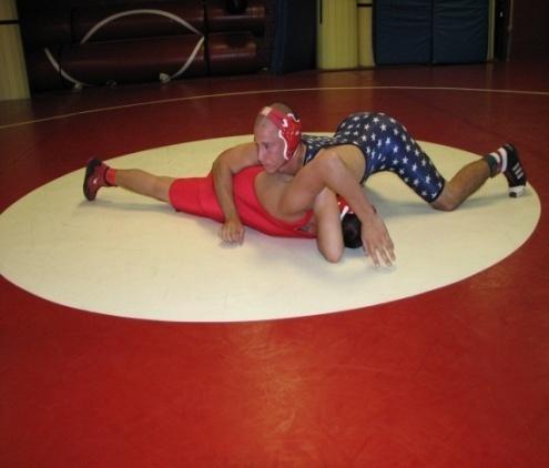 wrestler is held on both elbows 48.