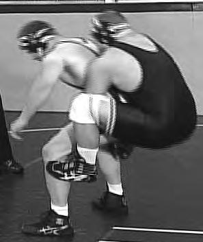 The leg cradle is legal in high school See link