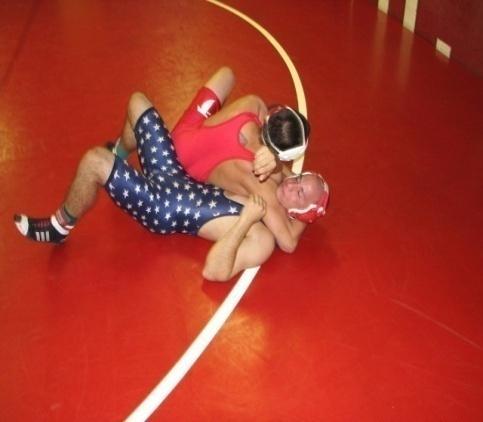 10. (5-15-1) Out of bounds. Two supporting parts of one wrestler must be inbounds.