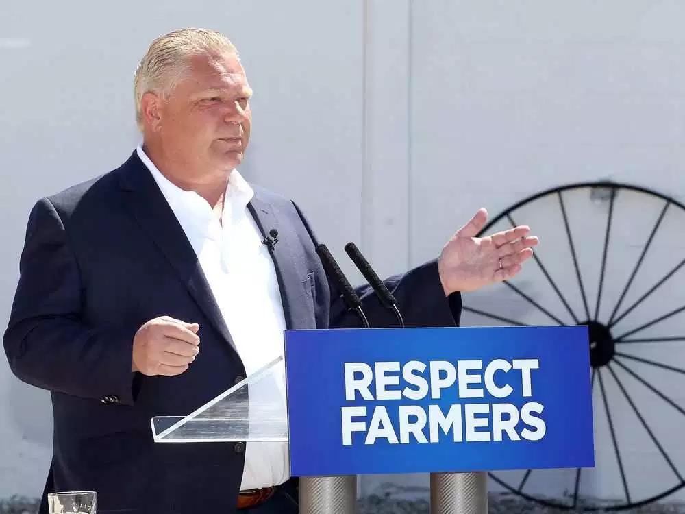 Doug Ford addresses the media and about 10 local farmers at the Trepanier Farm on Lakeshore Road 235 May 23, 2018. Ford made an announcement and took five questions from the media.