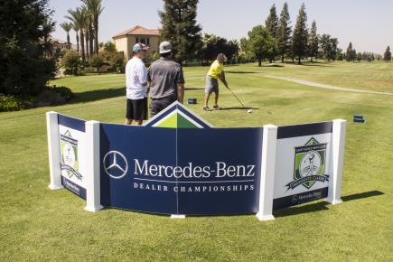 Company logo on event signage and on driving range.
