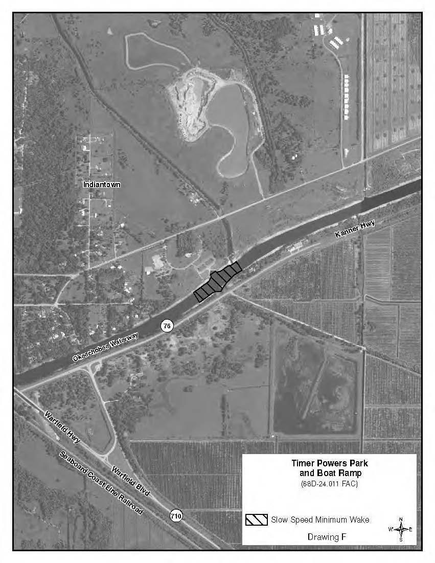(f) Timer Powers Park and Boat Ramp A Slow Speed Minimum Wake boating restricted area from shoreline to shoreline, in and adjacent to the Okeechobee Waterway, bounded on the northeast by a line drawn