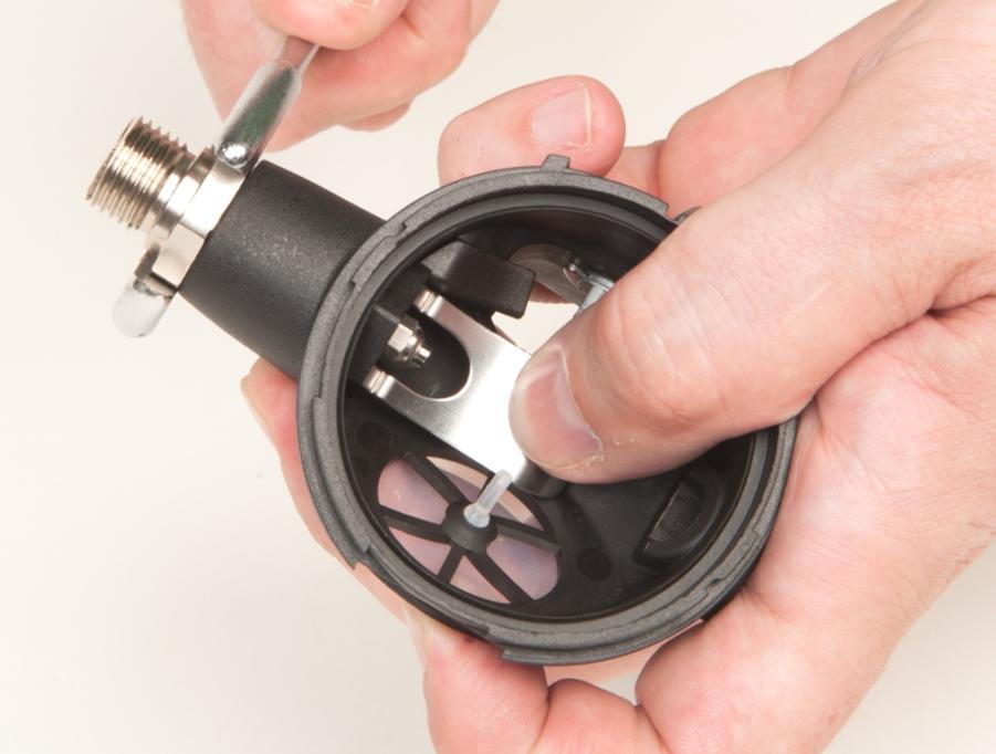 phases of assembly Then, without applying excessive force, tighten the nozzle unit to the valve body with a 19-mm