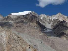 neighbouring glacier, where camp was established at 5,500 m. The following day the team departed from camp, crossed the glacier to the South ridge of Moel Kangri.