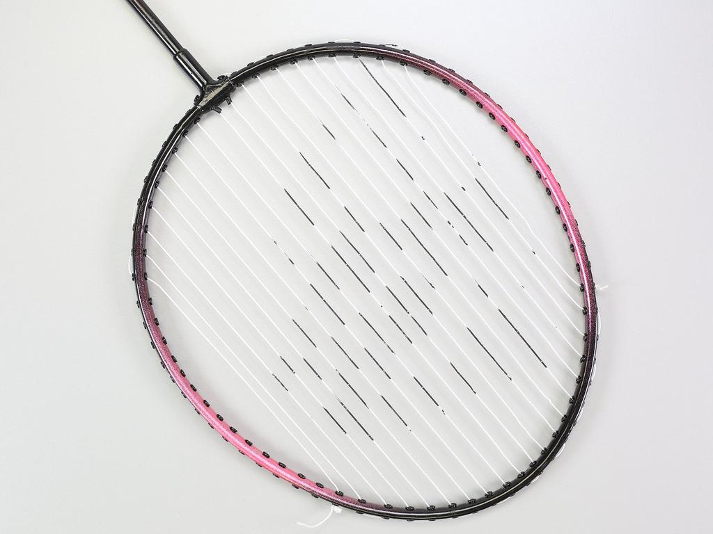 Step 6 Perform the same steps of stringing on the other side of the racquet and make a knot at