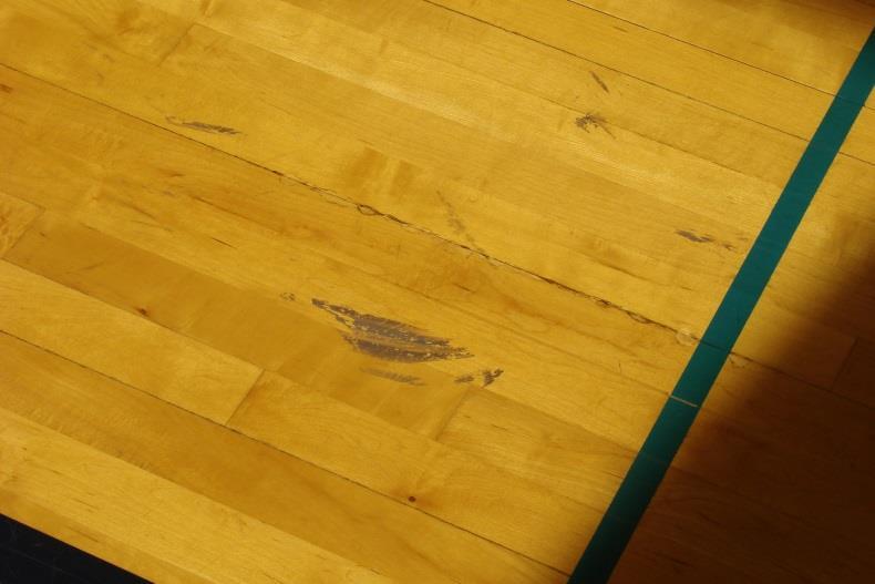 R i s k M a n a g e m e n t A s s e s s m e n t P a g e 9 Figure #9 Basketball Court Surface Skid Figure #9 is a picture of a skid mark/substance on the basketball court surface that should not be on