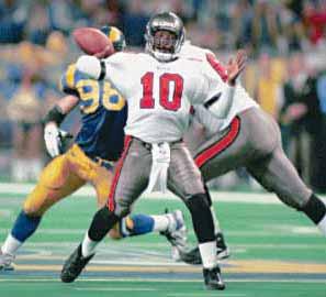 DE Steve White intercepted NFL MVP Kurt Warner on the first play of the game, setting up the Tampa Bay offense at the St. Louis 20. Martin Gramatica booted a 25-yard FG, giving the Bucs a 3-0 lead.