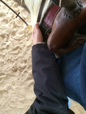 on the knee, be careful not to put any pressure on the knee or you may unbalance the rider The knee hold can be used to help stabilize a rider who has minimal to moderate balance concerns, provide