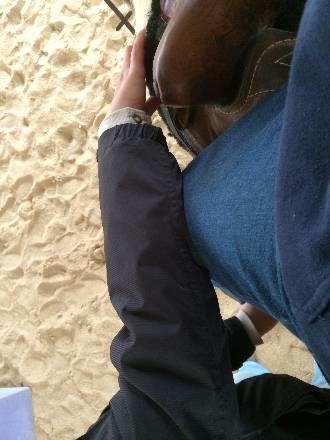 helps to lock in a rider who has several balance concerns The thigh hold is a taxing hold and if your arm becomes sore or tired, signal your HEAD WALKER to stop the horse, change position ONE SIDE