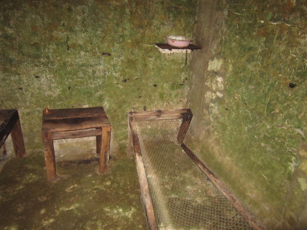 This is where the officers slept in the tunnel. All they had was a bed and a small table and chair.