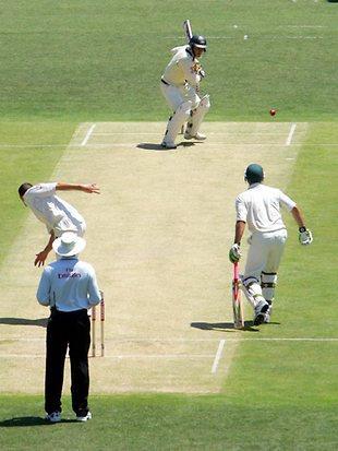 Wide Ball By extending both arms horizontally first to the batsman then to the scorers.