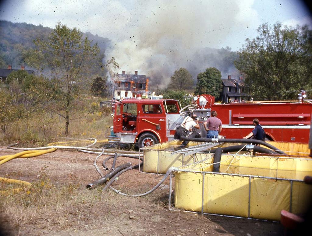 Slide 4 Figure 1. A 1000-gpm pumper supplies the attack pumper at a live-fire training session using an acquired structure.