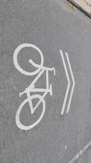 Sharrows Sharrows remind cyclists and motorists to share the road and be mindful of one
