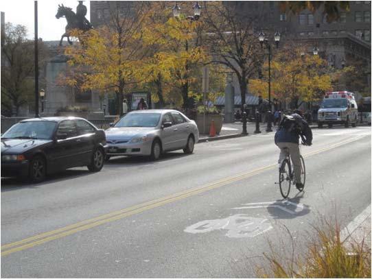 Bicycle lanes should be 4-6 feet wide. If there is more space, a painted buffer might also be added as shown to the left.