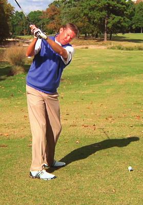 Fix Your Slice 11 Back of the Left Hand As you turn back, make sure the back of the left hand is flat.