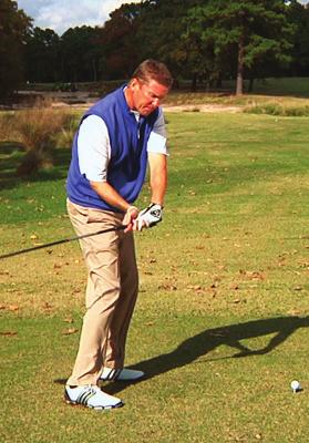 shoulders at the top of your swing.